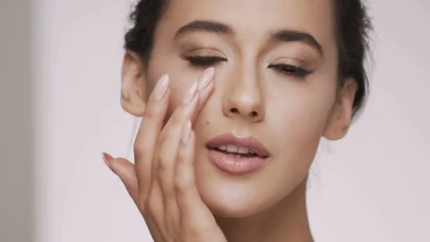 Attractive brunette model at studio background Stock Footage 92523026