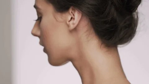 Attractive brunette model at studio background Stock Footage 92524593