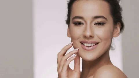 Attractive brunette model at studio background Stock Footage 92525875