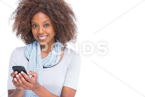Attractive brunette typing a text message Stock Photos