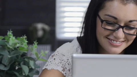 Attractive brunette woman using tablet computer retail internet surfing. Video stock 199629153
