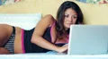 attractive business woman in lingerie working with laptop at the hotel HD Footage
