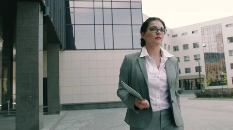 Attractive business woman running to the office Stock Footage