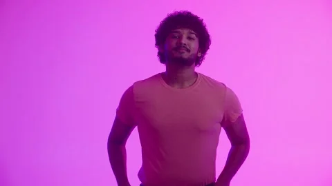 An attractive cheerful african american guy model or actor with a charming Stock Footage 262130853