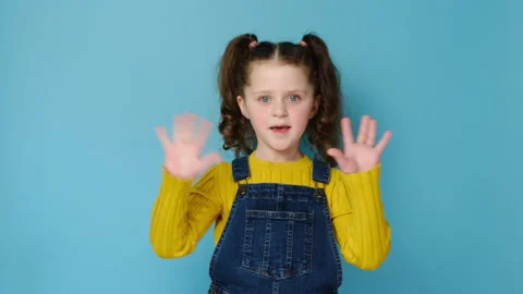 Attractive child point finger camera on you waving meeting greeting with hands Stock Footage 151896341