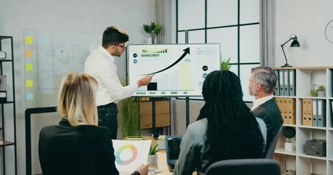 Attractive concentrated successful experienced mixed race businesspeople Stock Footage 161031652