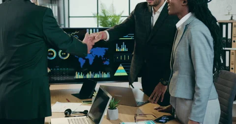 Attractive confident positive successful mixed race people handshaking between Stock Footage 160920428