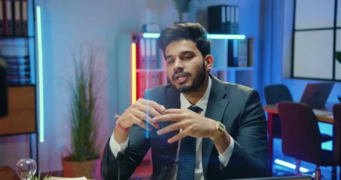 Attractive confident professional bearded office coach in suit holding business Stock Footage 166551901