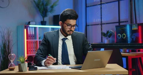 Attractive confident purposeful hardworking bearded businessman in suit working Stock Footage 166673964