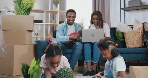 Attractive contented in high spirits young african american family with three Stock Footage 150653578