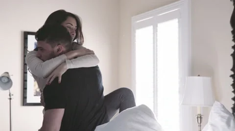 Attractive couple getting out of bed in the morning Video stock 58408763
