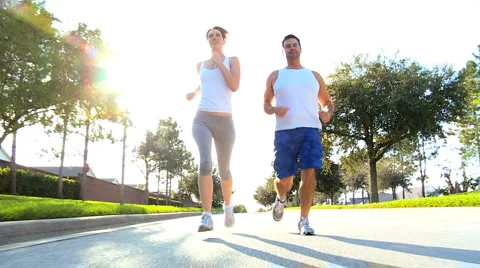 Attractive Couple Jogging to Keep Fit Stock Footage 3832259