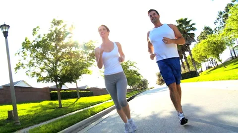 Attractive Couple Jogging to Keep Fit Stock Footage 4516681
