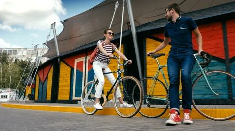 Attractive couple rest with bicycles Stock Footage 63355356