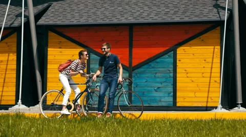 Attractive couple rest with bicycles Stock Footage 63357502