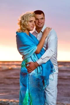 Attractive couple at sunset Stock Photos
