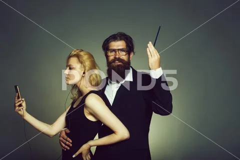 Attractive couple of young sexi woman with mobile Stock Photos