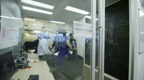 Attractive diverse business group in a team meeting in modern city office. Stock Footage 35181153