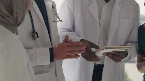 Attractive doctors physician and multinational colleagues, diverse workmates Stock Footage 291808350