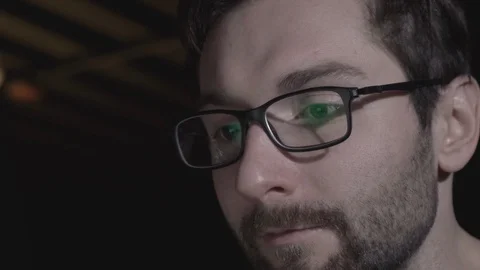 Attractive effective office worker working hard at his cabinet late at night Stock Footage 118375245