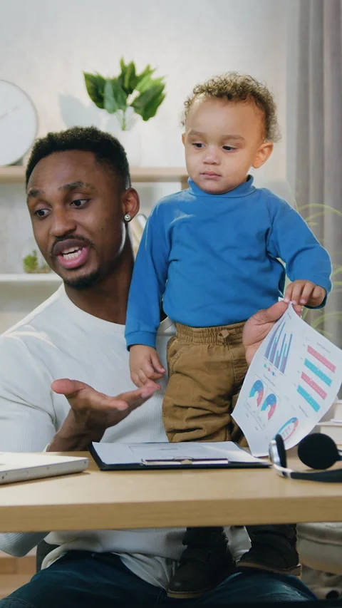 Attractive experienced caring young black-skinned father which stayed at home wi Stock Footage 329437509