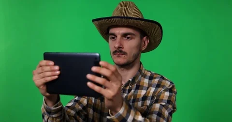 Attractive Farmer Man Occupation Browsing Digital Tablet Green Screen Background Stock Footage 80288079