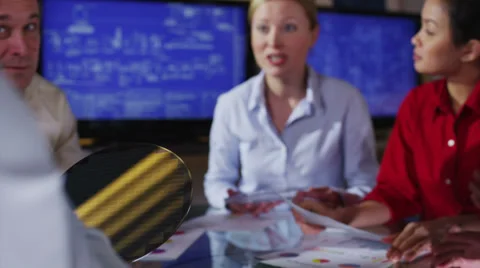 Attractive female architect or engineer in a business meeting Stock Footage 28634539