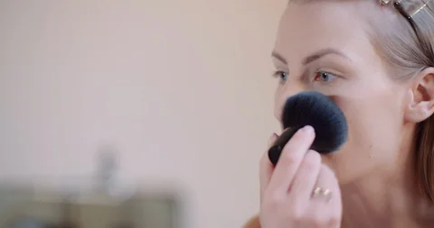Attractive Female doing Makeup Applaying Powder 스톡 동영상 128759271