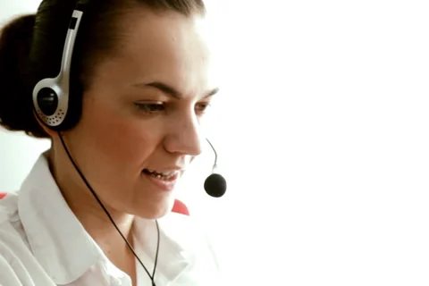 Attractive female helpdesk consultant Stock Footage