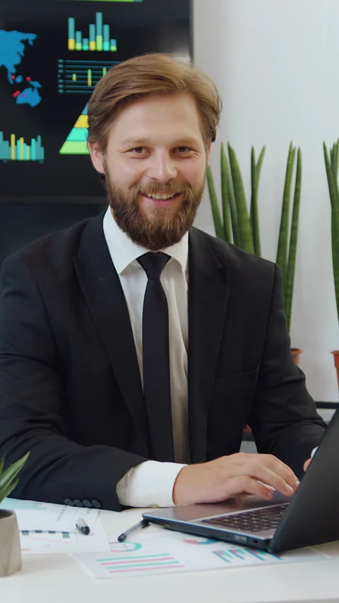 Attractive friendly professional high-skilled 35-aged corporate boss with beard  Stock Footage 330797166