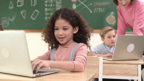 Attractive girl coding prompt while looking at camera at STEM class. Pedagogy. Stock Footage 274432215