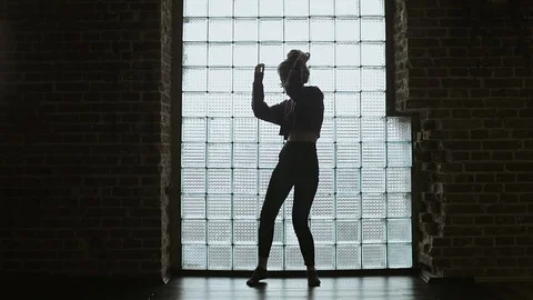 Attractive Girl Dancing Along While Listening to Music Stock-Footage 109106040