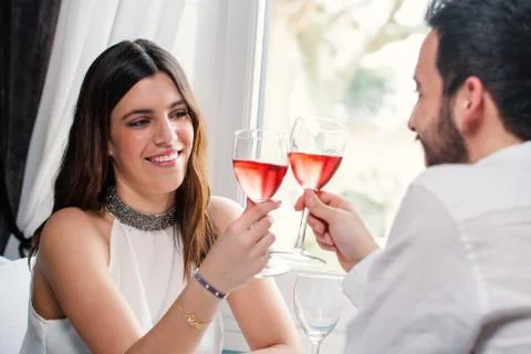 Attractive girl at dinner with boyfriend Foto stock