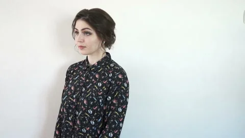 Attractive girl posing in front of the camera Stock Footage 116555066