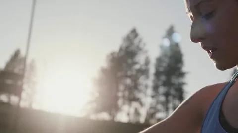 Attractive girl preparing to start workout Stock Footage 78983977