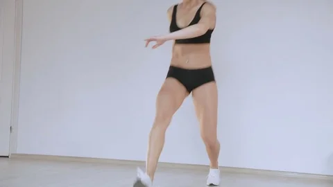 Attractive girl training mobile exercises in the gym. Slow motion Stock Footage