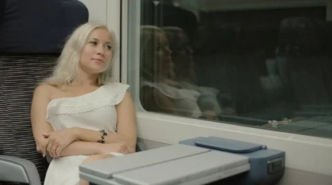 Attractive girl traveling by train Stock Footage 59805191