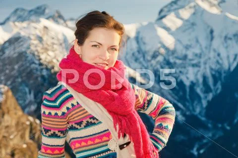 Attractive girl in winter Alps Stock Photos