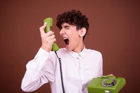 An attractive guy has different emotions. Stock Photos