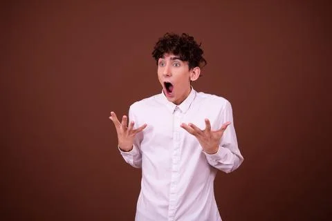 An attractive guy has different emotions. Foto stock