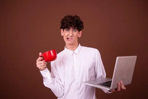An attractive guy has different emotions. Foto stock