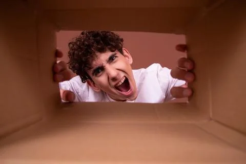 An attractive guy has different emotions. Foto stock