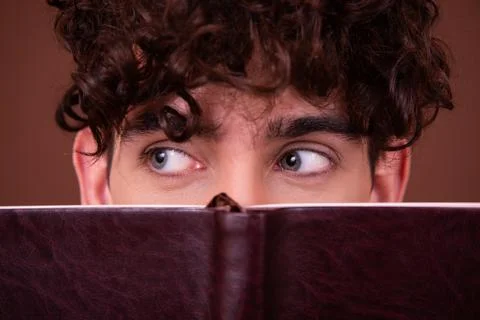 An attractive guy has different emotions. Foto stock
