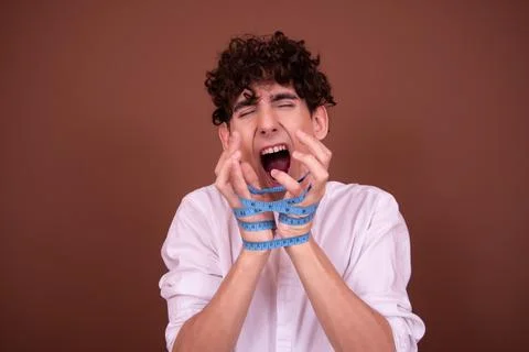 An attractive guy has different emotions. Stock Photos
