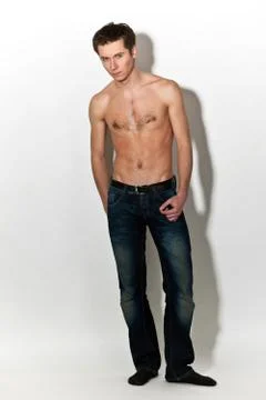 Attractive guy posing on white background Foto stock