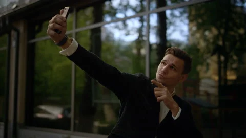 Attractive guy using modern technology gadget concept. Happy business man user Stock-Footage 131669980