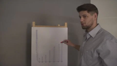 Attractive handsome young man presenting result business project table graph bar Stockbeeldmateriaal 138125622