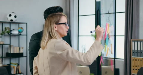Attractive hardworking creative skilled teammates working over new ideas for Stock Footage 157982454