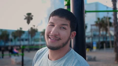 Attractive Hispanic man chilling after hard workout leisure time on training Stock Footage 108442747