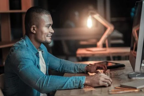 Attractive IT guy debugging 스톡 사진